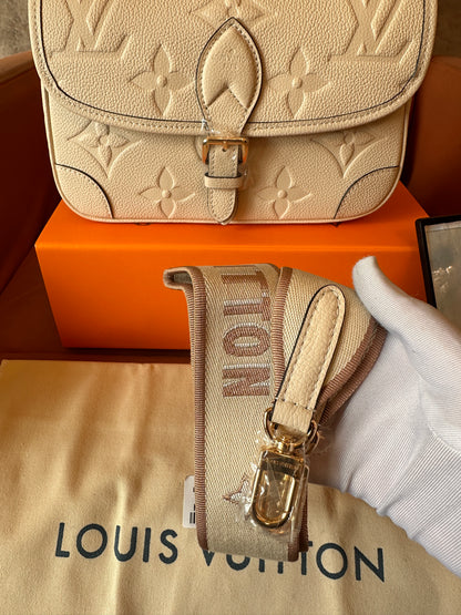 Louis Vuitton monogram Empreinte leather pochette bag