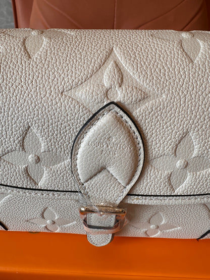 Louis Vuitton monogram Empreinte leather pochette bag