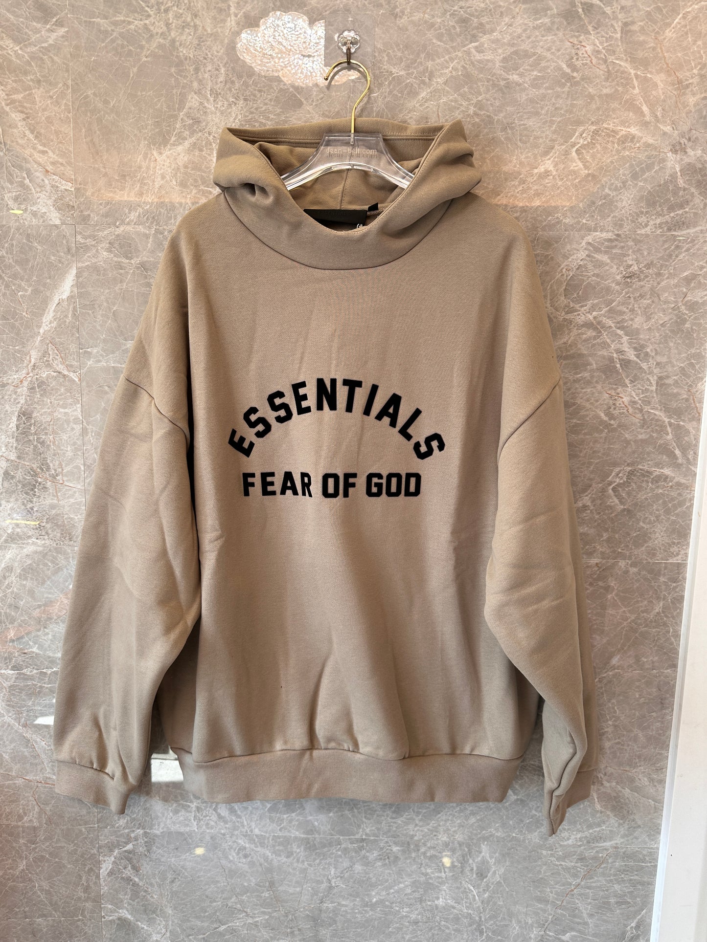 Fear of God Essentials oversized hoodie in taupe