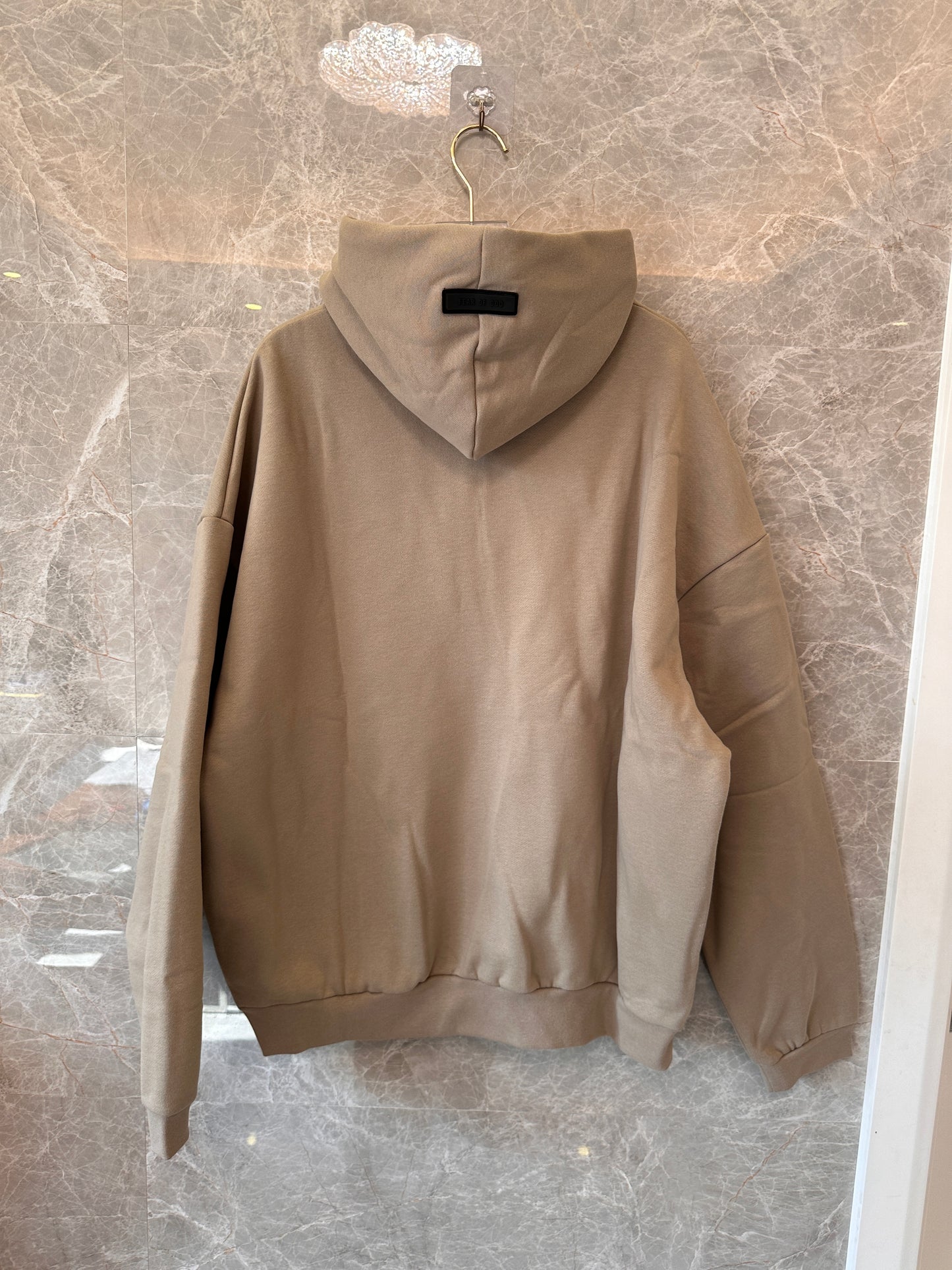 Fear of God Essentials oversized hoodie in taupe