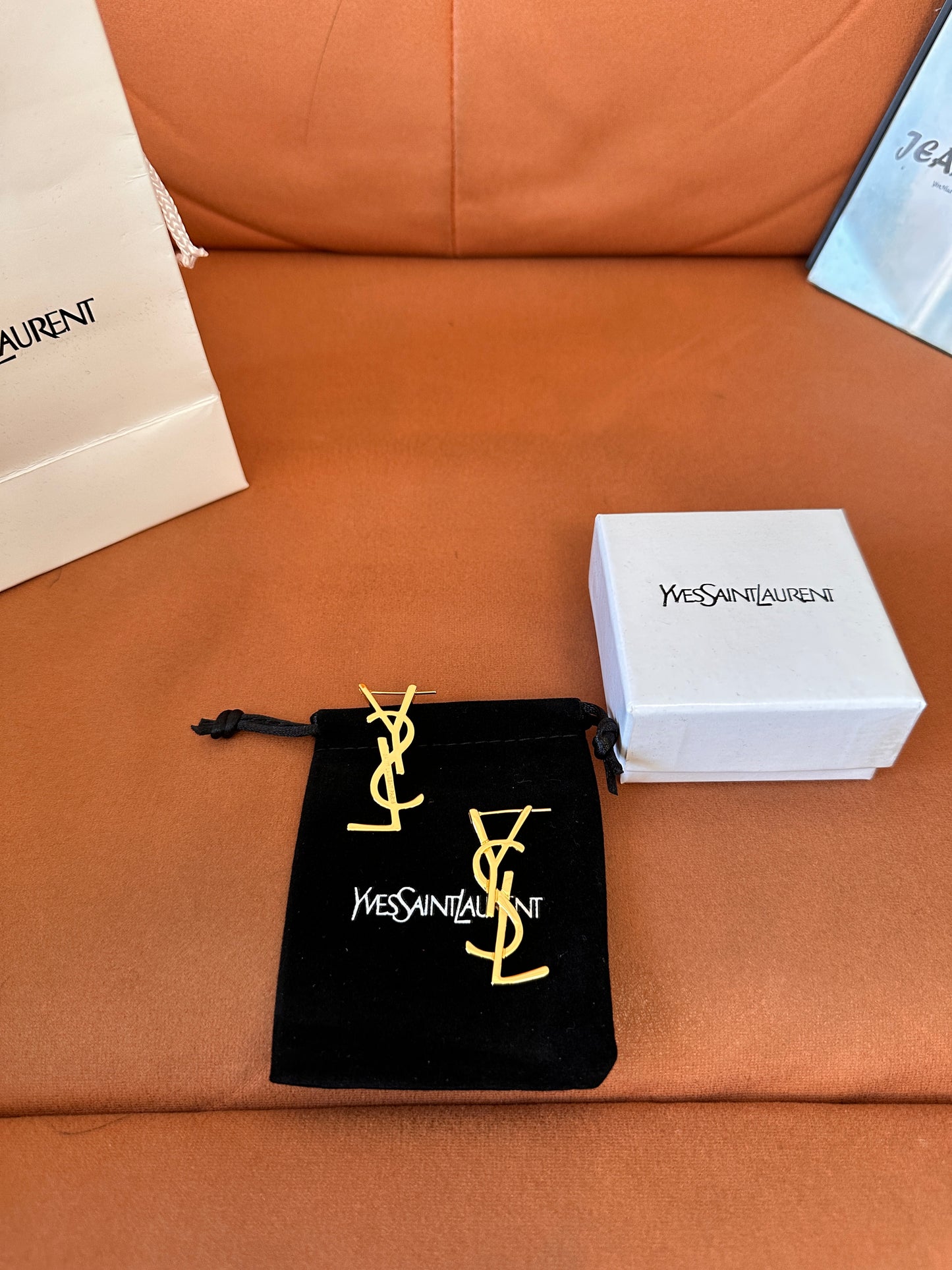 Yves Saint Laurent (YSL) gold logo earrings