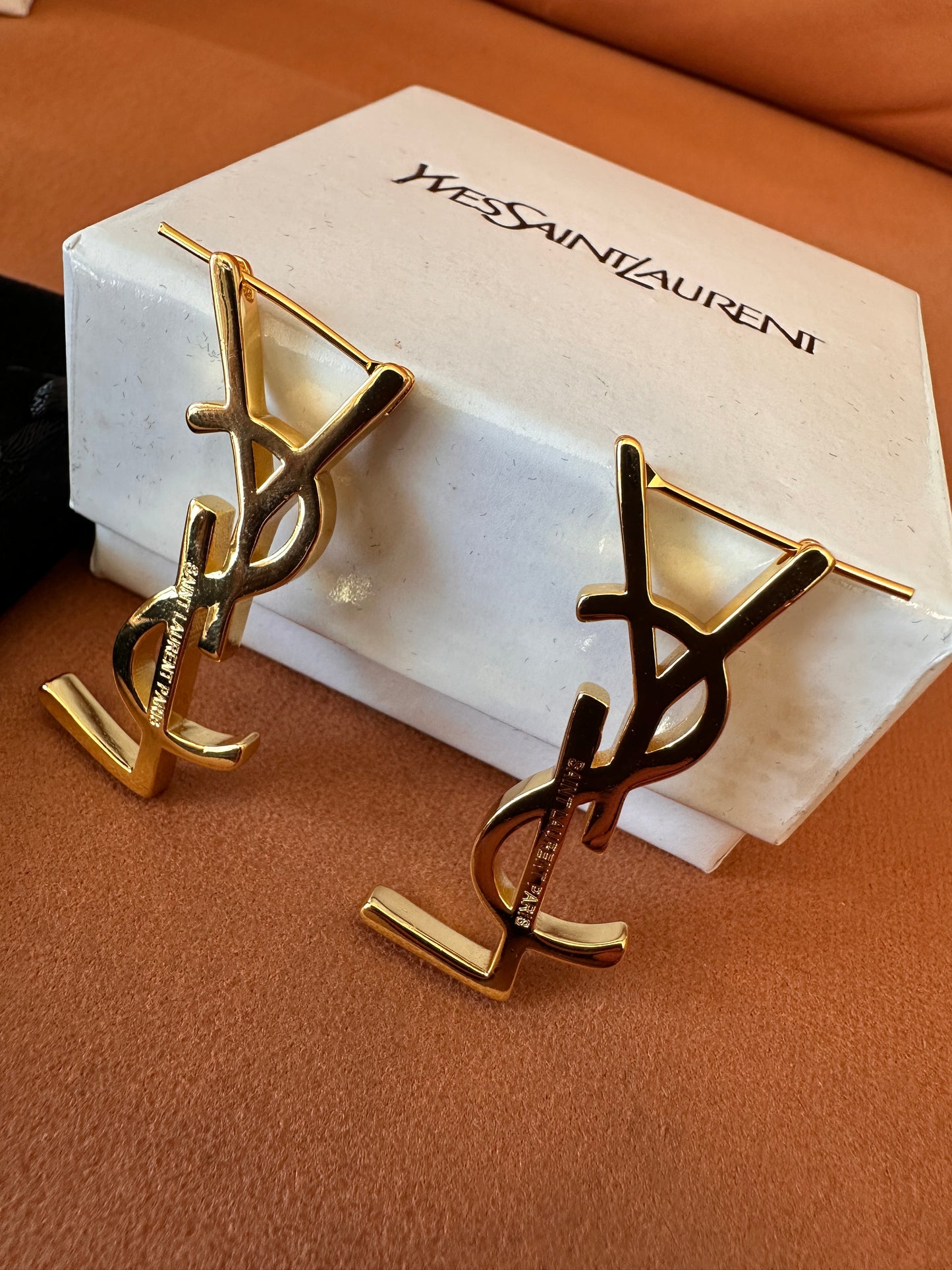 Yves Saint Laurent (YSL) gold logo earrings