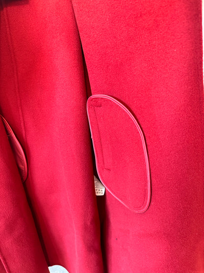 Hermes red wool coat with asymmetric collar and leather buckle