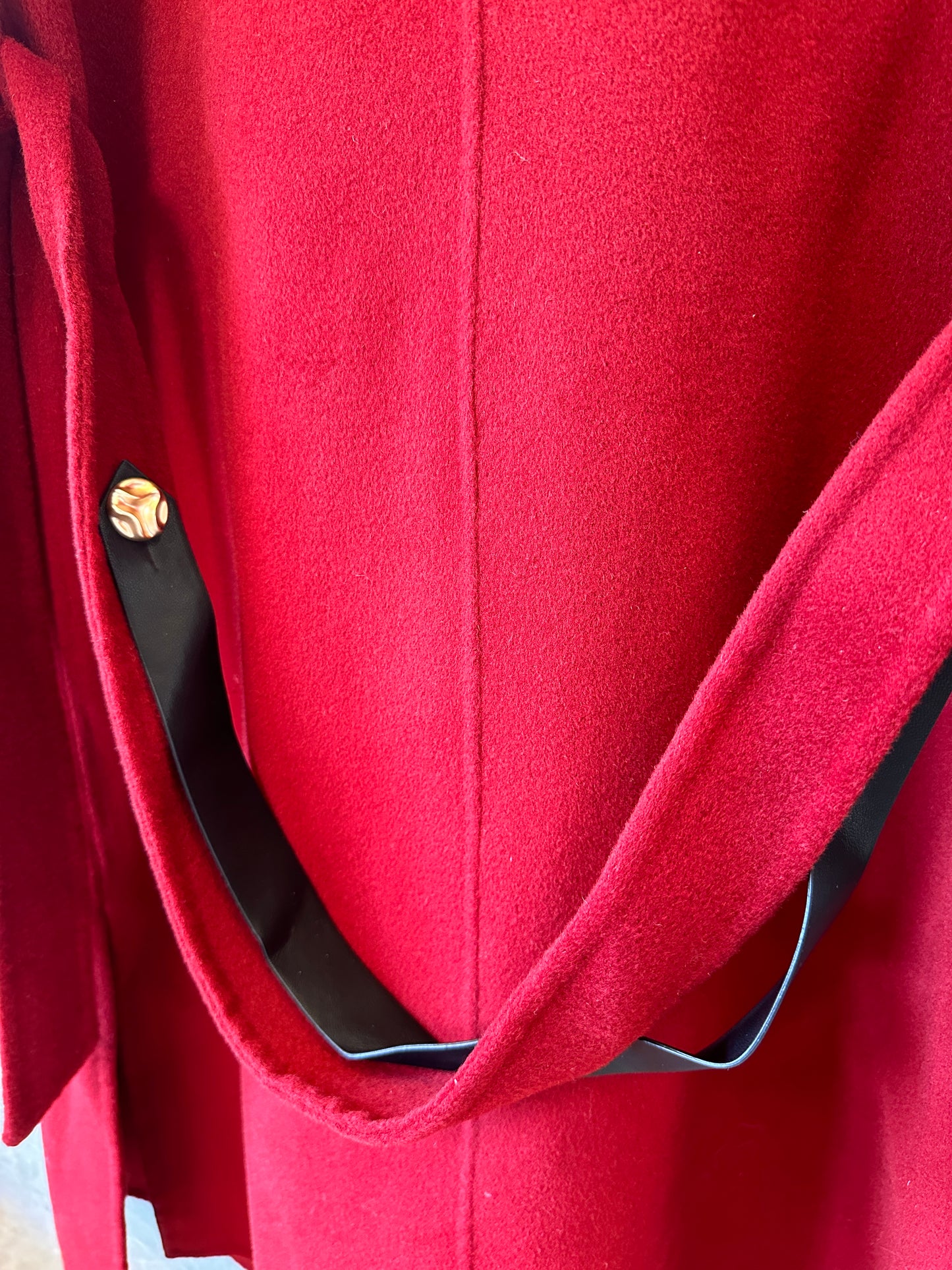 Hermes red wool coat with asymmetric collar and leather buckle