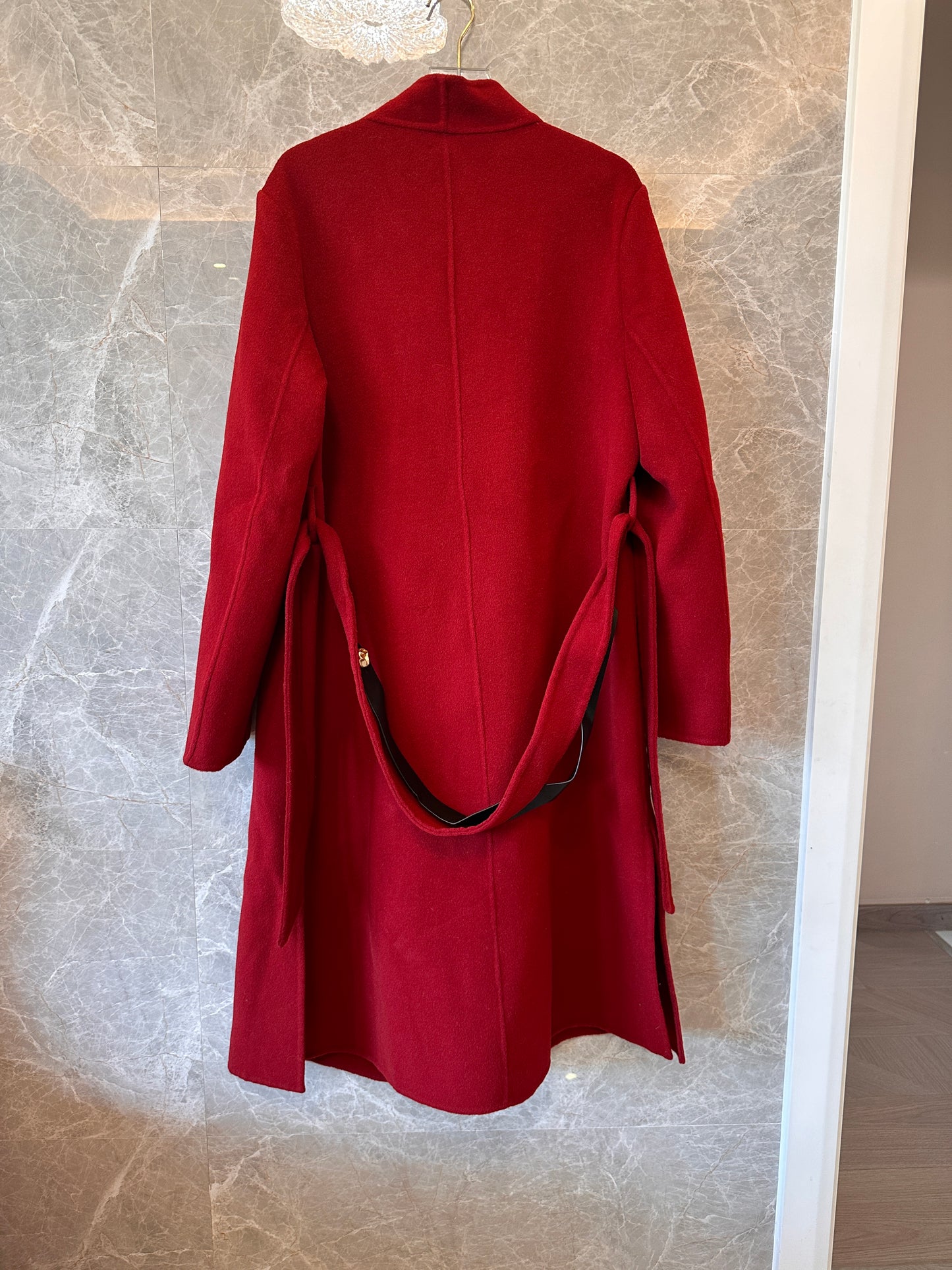 Hermes red wool coat with asymmetric collar and leather buckle