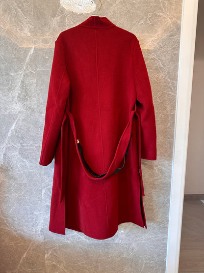 Hermes red wool coat with asymmetric collar and leather buckle