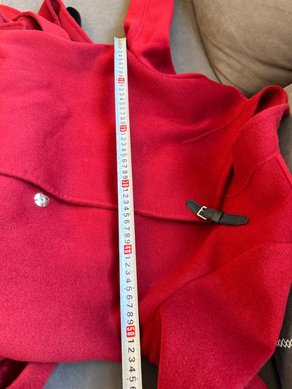 Hermes red wool coat with asymmetric collar and leather buckle