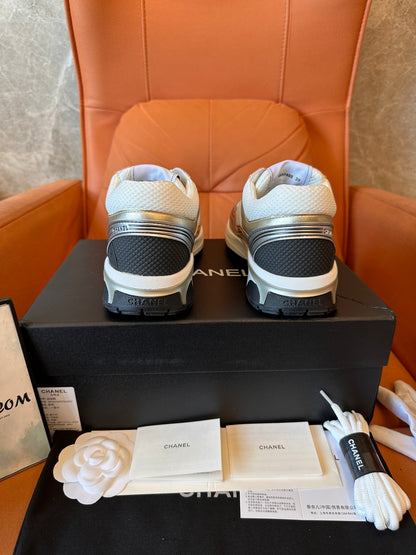 Chanel CC Trainers – white and gold sneakers with iconic logo