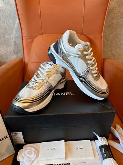 Chanel CC Trainers – white and gold sneakers with iconic logo