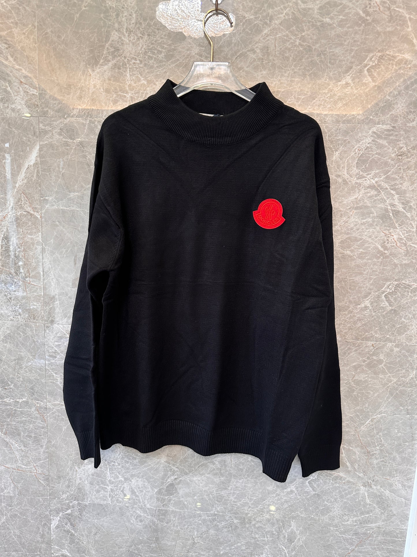 Moncler men's black knit sweater with red logo patch