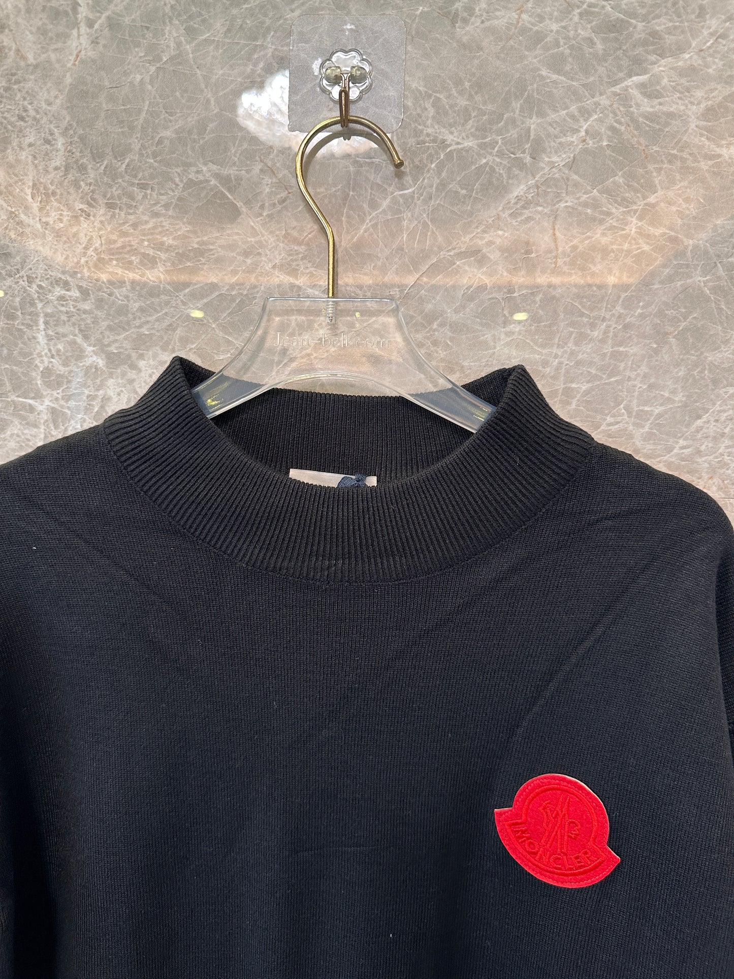 Moncler men's black knit sweater with red logo patch