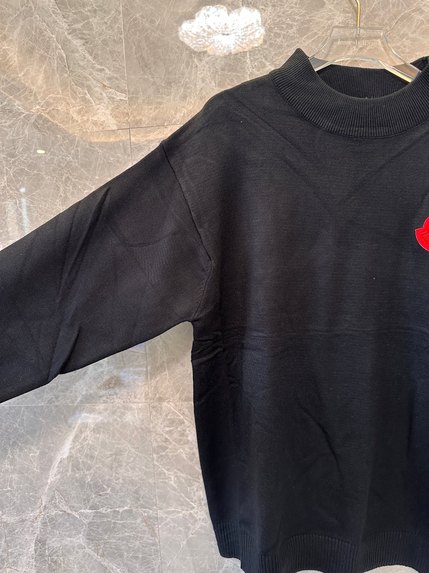 Moncler men's black knit sweater with red logo patch