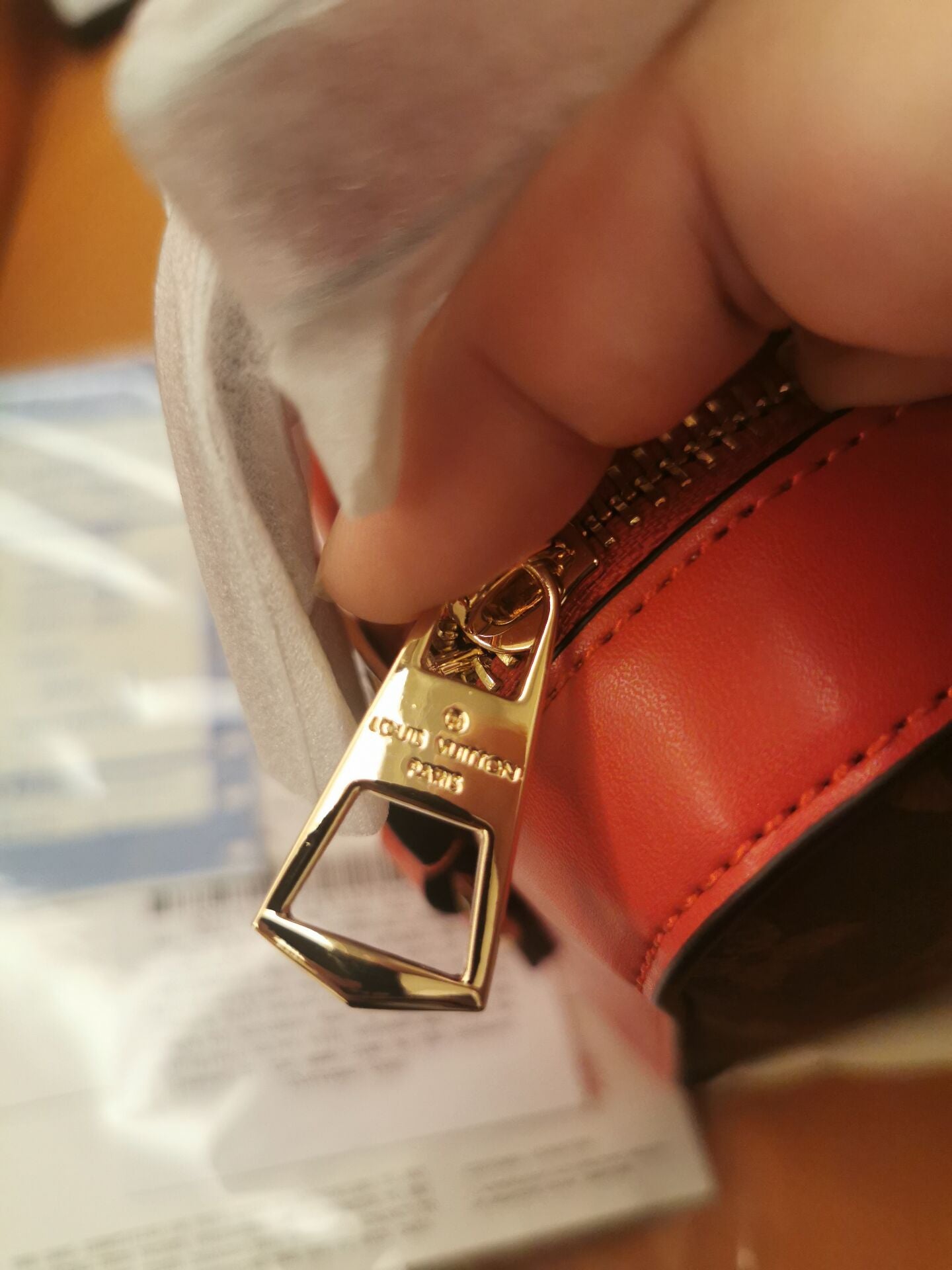 Louis Vuitton red monogram canvas saintonge