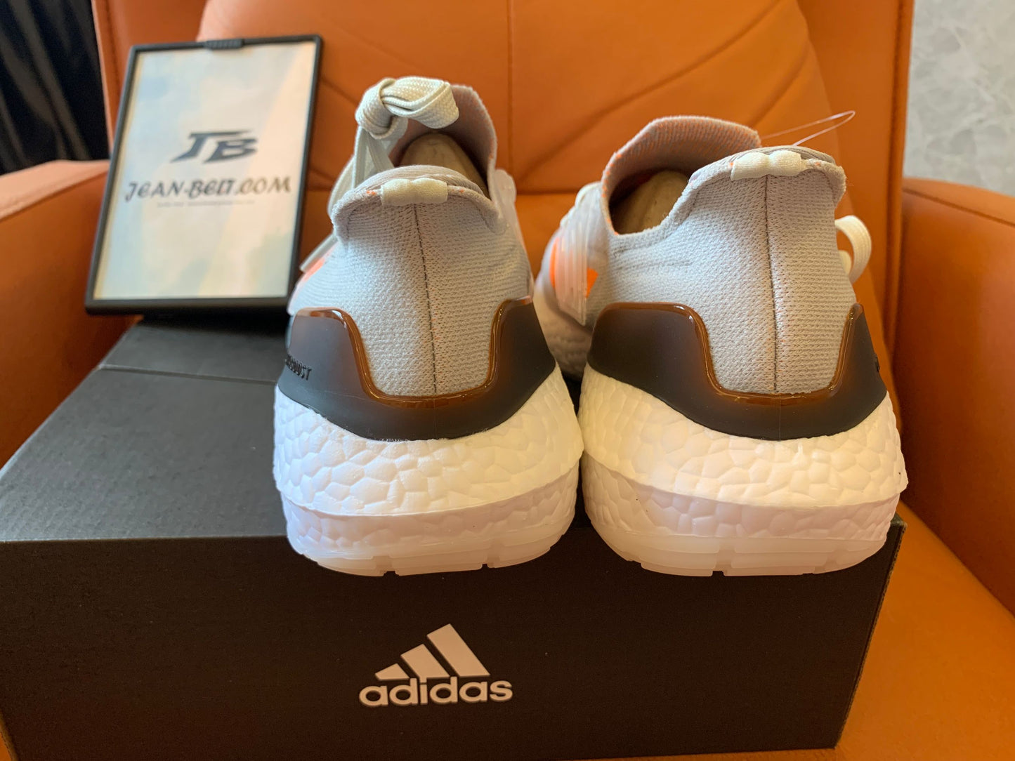 Adidas Ultraboost 22 - light gray with orange accents