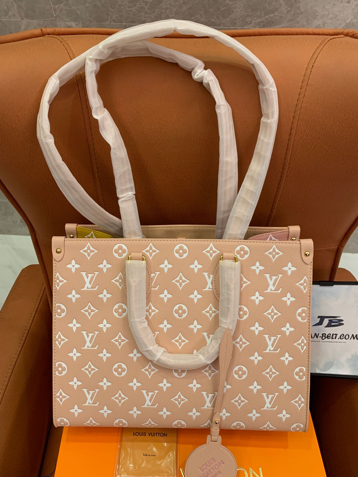 Louis Vuitton empreinte monogram spring in the city onthego mm beige pink yellowe