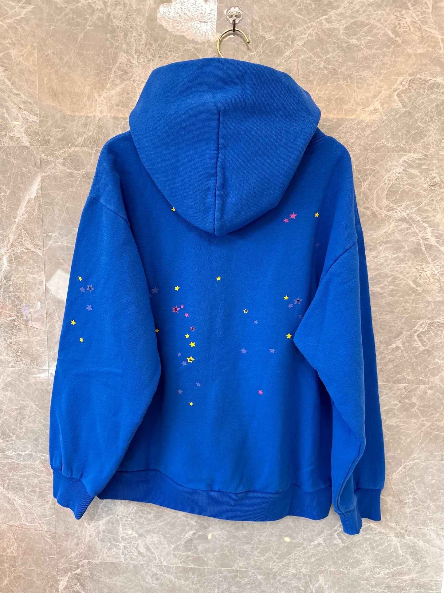 Sp5der blue hoodie with spider web graphic