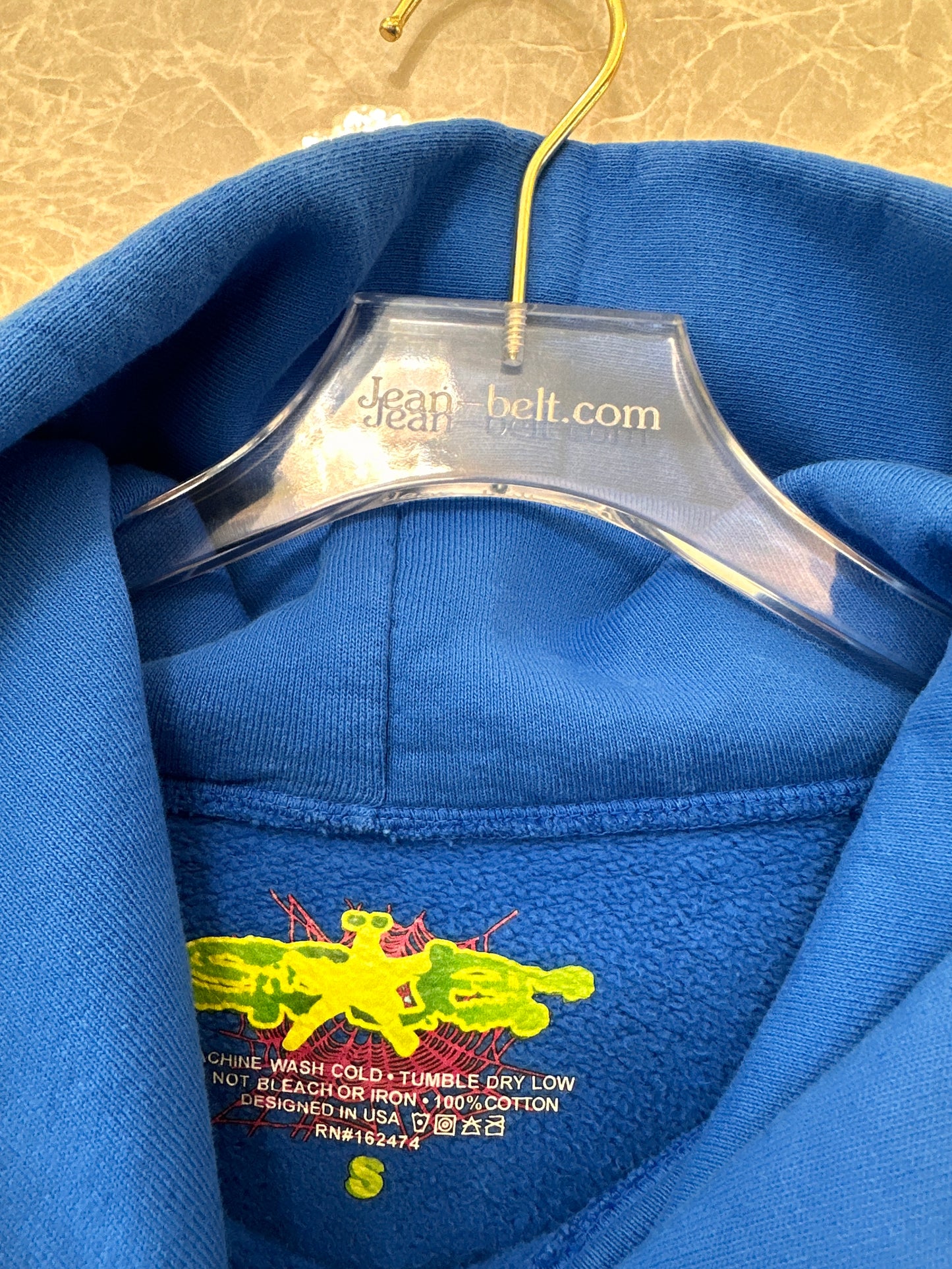 Sp5der blue hoodie with spider web graphic