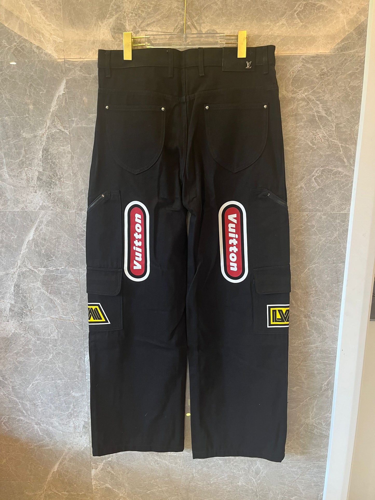 Louis Vuitton racing printed denim pants