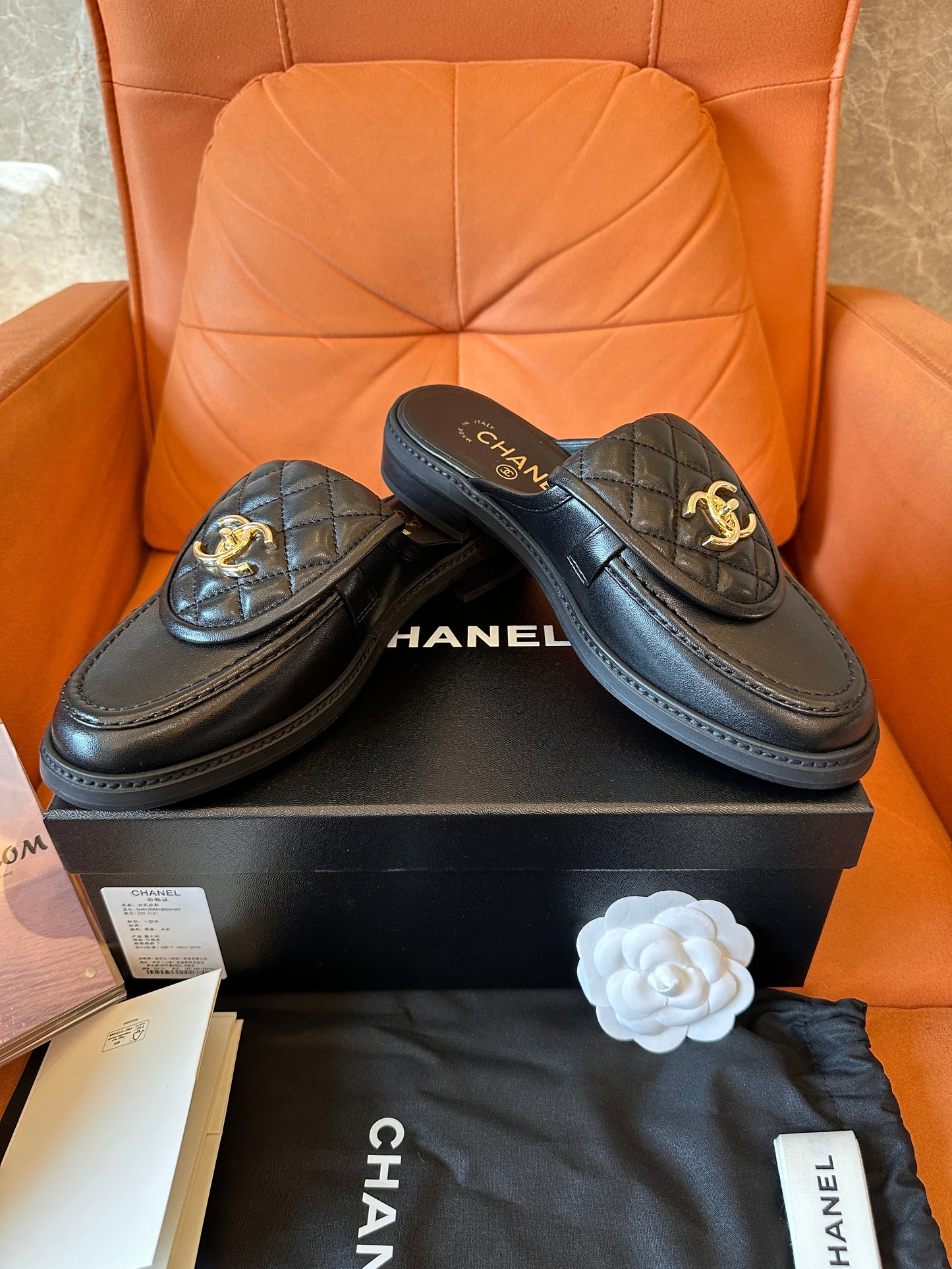 Chanel quilted leather slippers with gold CC logo