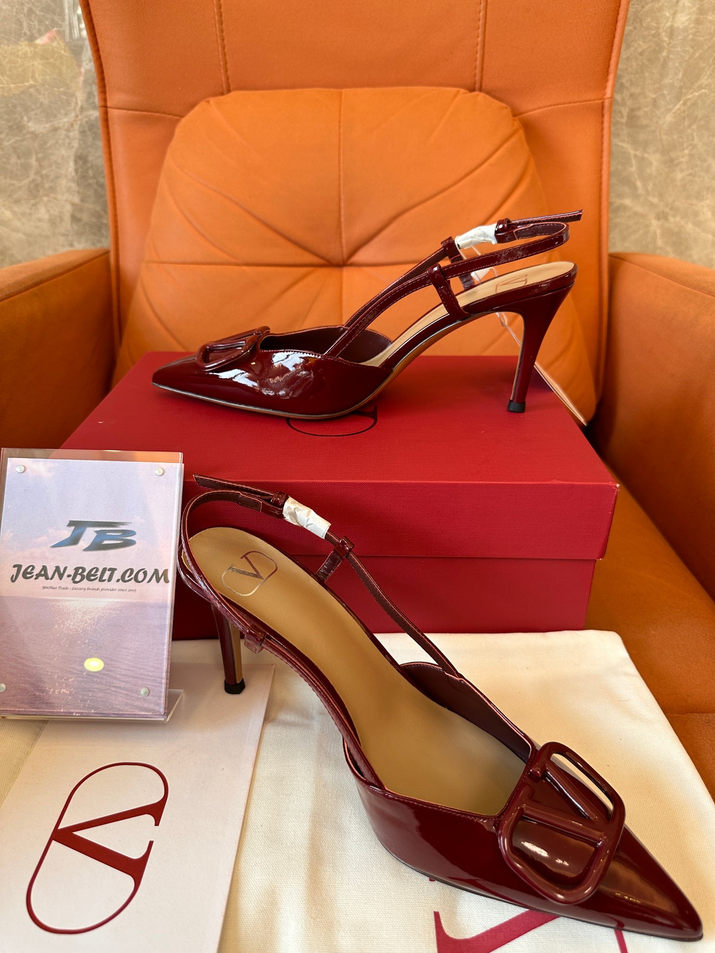 Valentino Garavani VLogo slingback pumps in burgundy patent leather