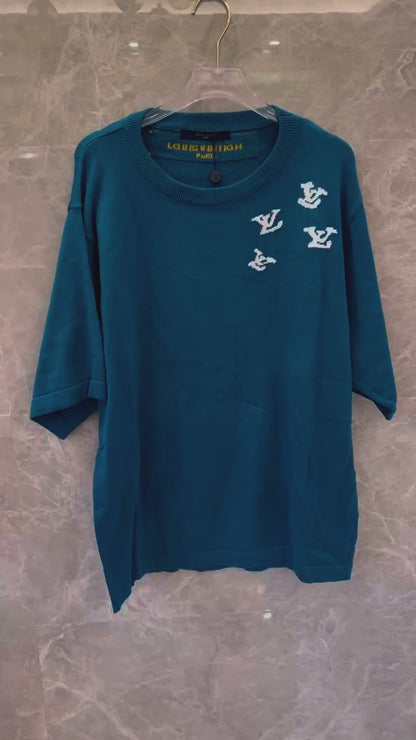 Louis Vuitton teal knit t-shirt with trumpeter motif and LV logos